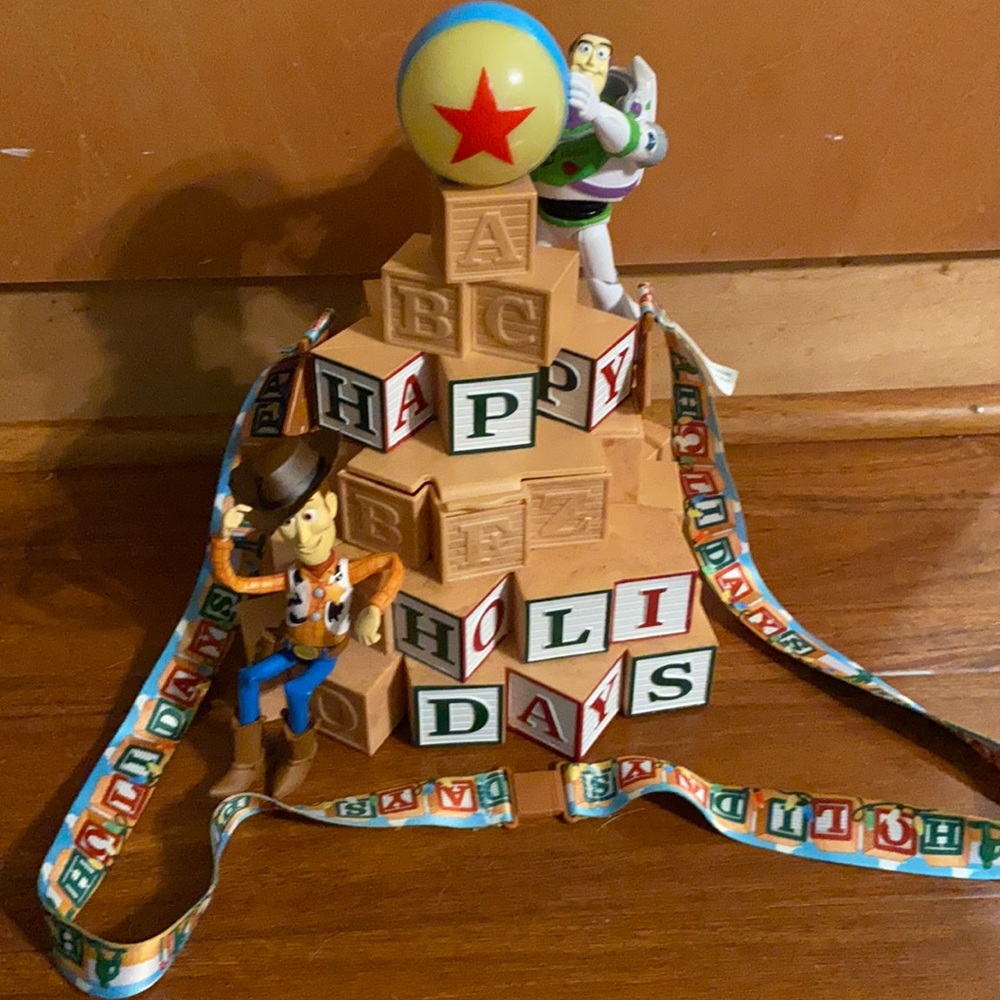 Toy story popcorn bucket holiday Disneyland exclusive. Pixar ball lights up.